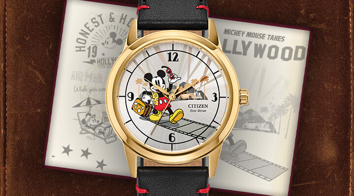Women's Disney Watches; Featuring Mickey Mouse Takes Hollywood watch model FE7063-07W on a leather background