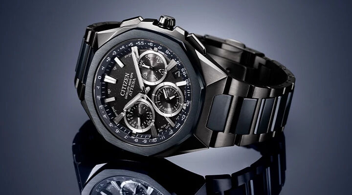 Shop Men's New Arrivals banner, featuring ATTESA watch model CC4106-74E on a reflective navy background